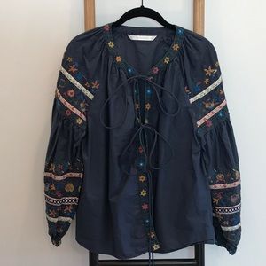 Embroidered tie front blouse